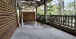 Terreno de venta en Omoa Cortes con naciente de agua y cabañas