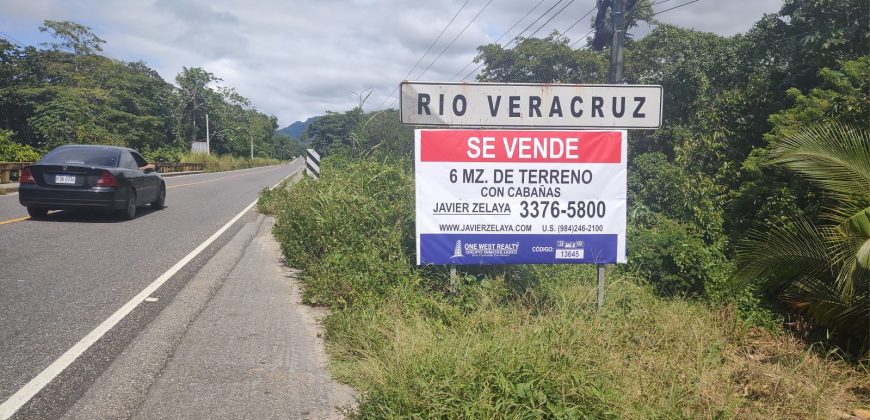 Terreno de venta en Omoa Cortes con naciente de agua y cabañas