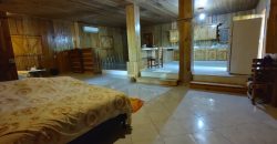Terreno de venta en Omoa Cortes con naciente de agua y cabañas